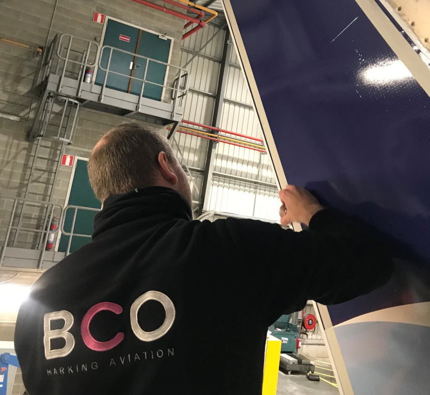 Illustration of: Aircraft winglets branded with innovative adhesive film